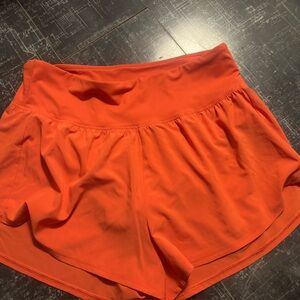 Women's Orange Athletic Shorts DSG high rise Stride size large moisture wicking